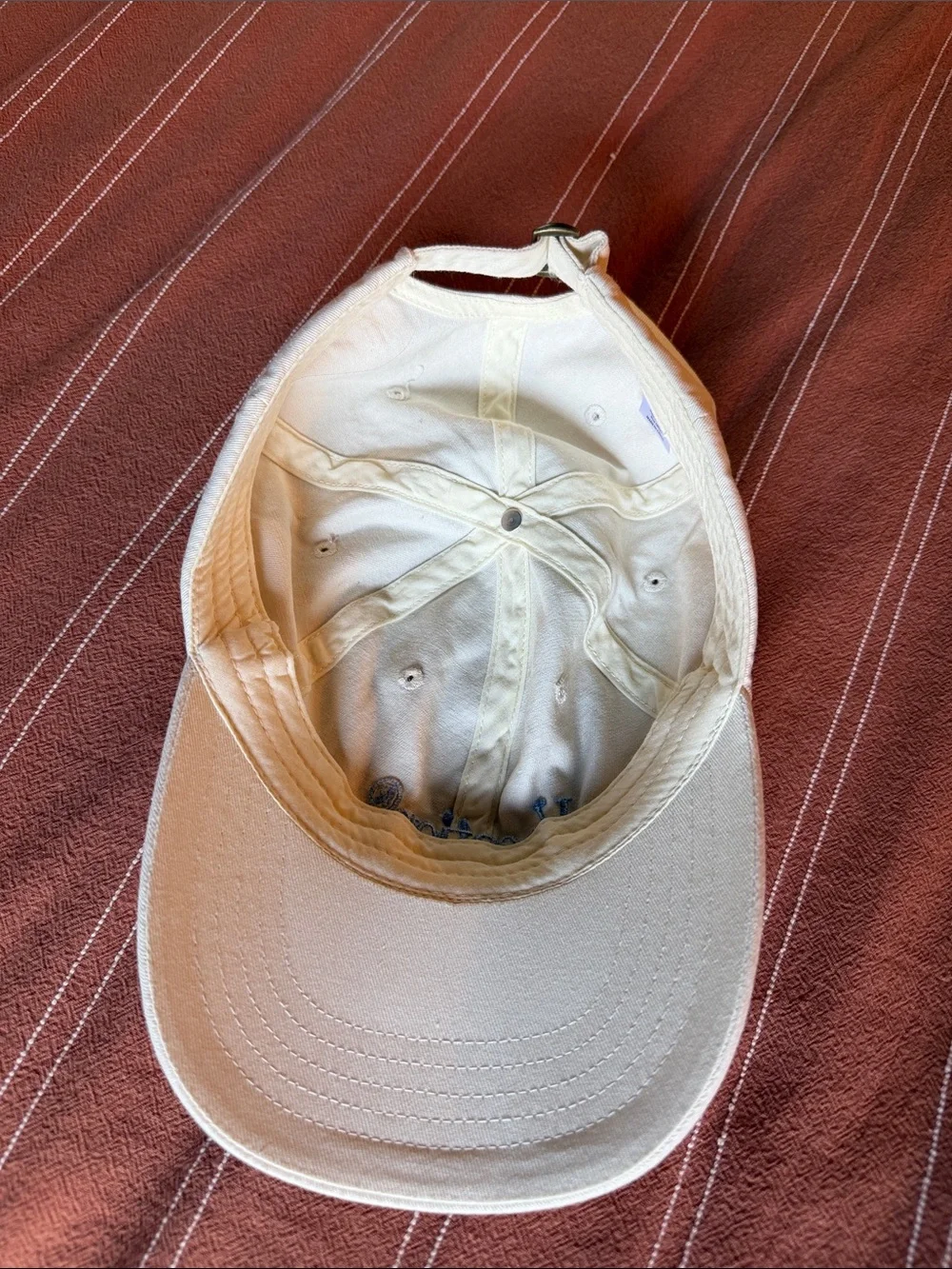 Vacation® Embroidered Cream Baseball Cap with Blue Lettering